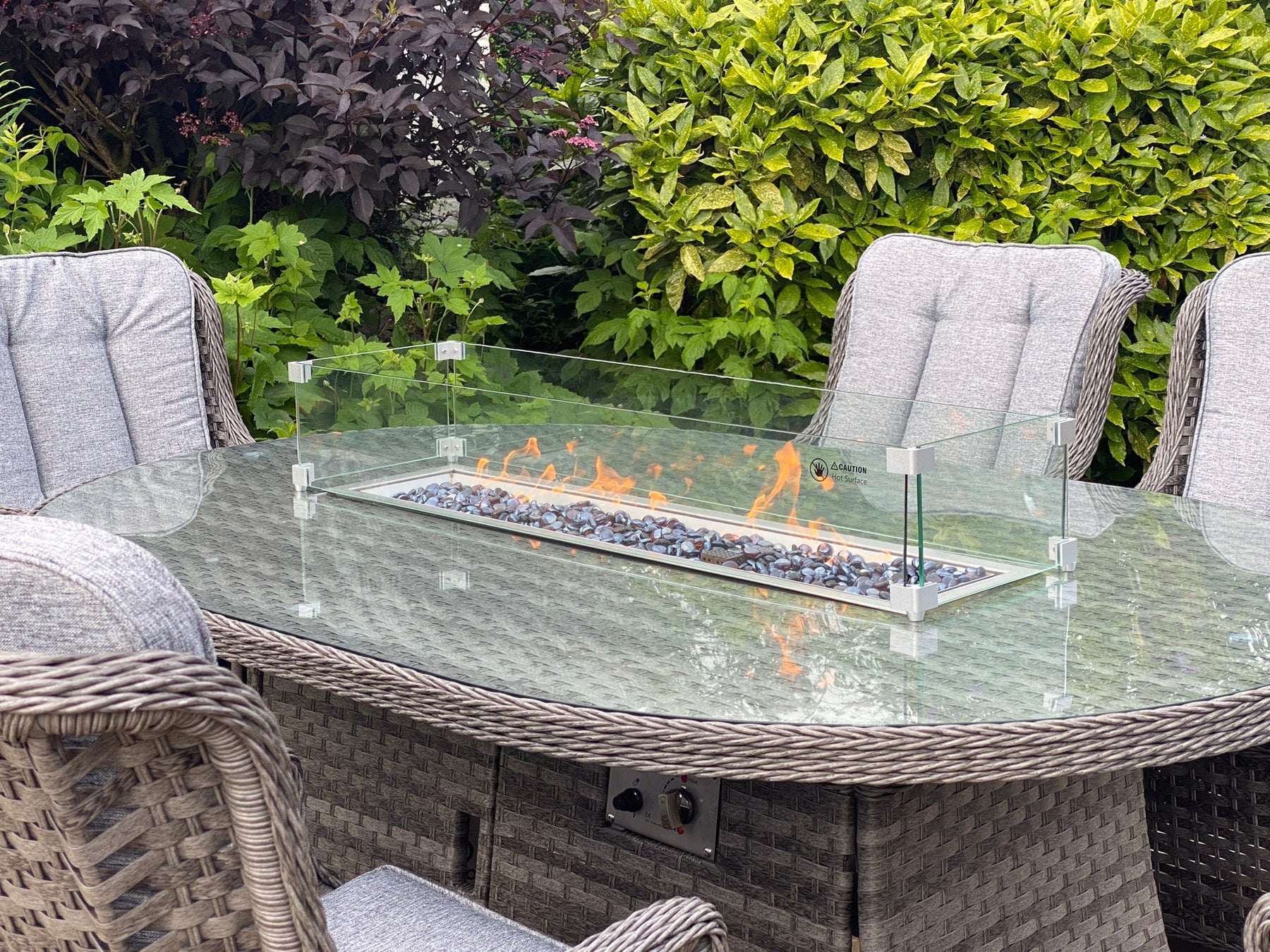 Amalfi 6 Seater Oval Outdoor Garden Firepit Dining Set in Dark Grey Rattan
