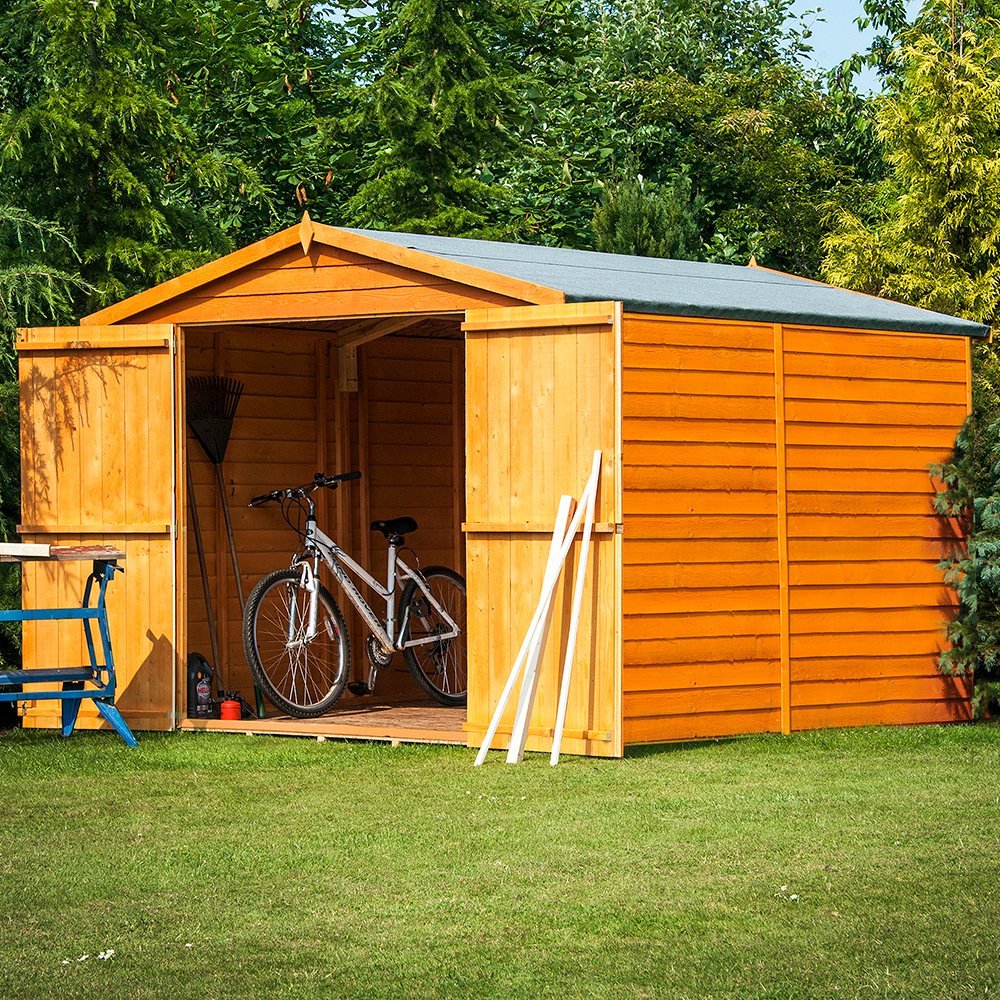 Shire Shed Image on grass with bicycle and workbench.