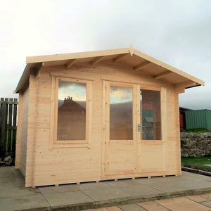 Shire 11x8 Berryfield Log Cabin in garden on patio