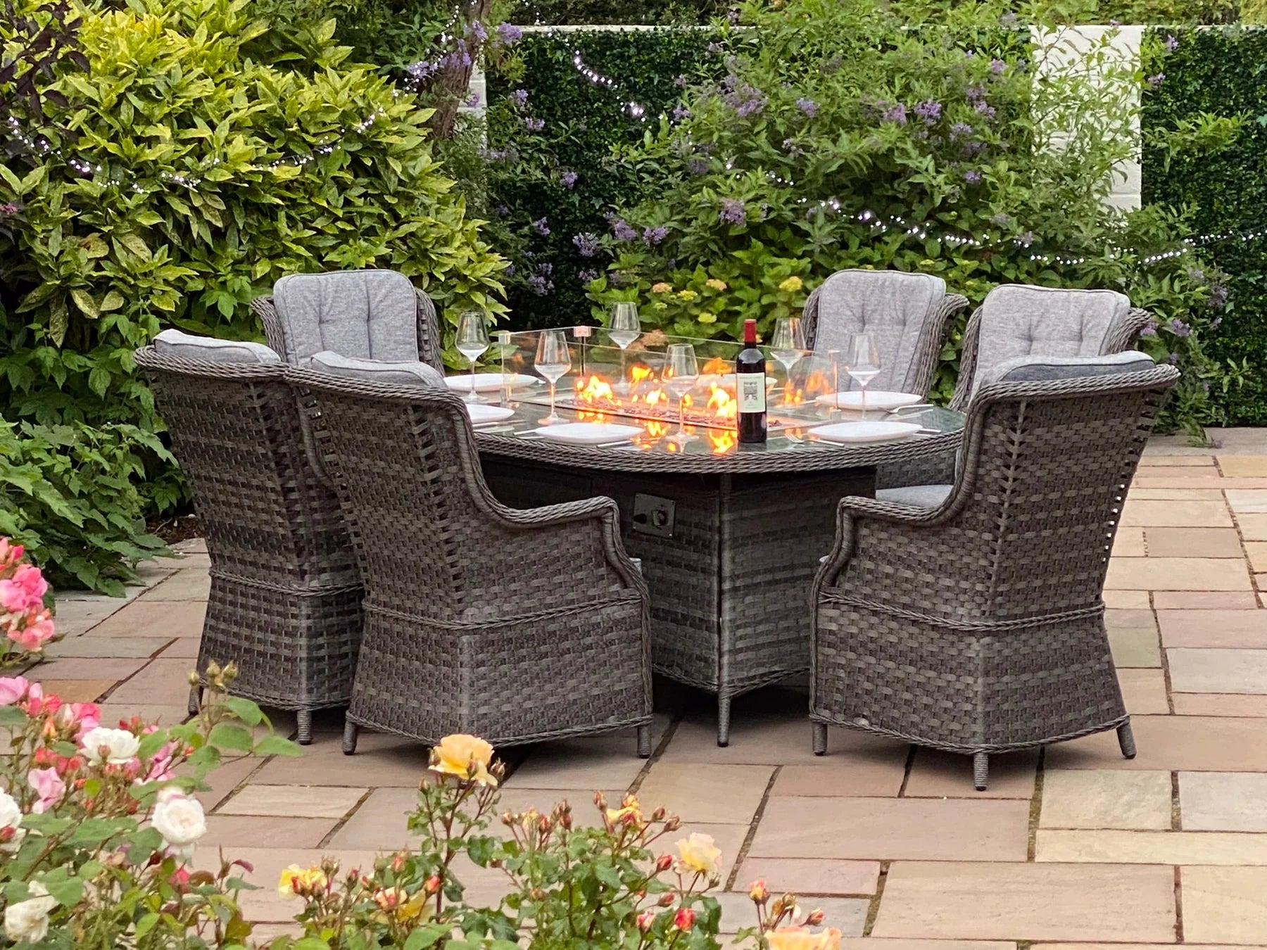 Amalfi 6 Seater Oval Outdoor Garden Firepit Dining Set in Dark Grey Rattan