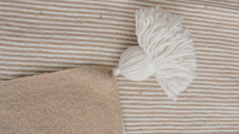 Pom Pom premium Wool blanket or throw in Camel stripes